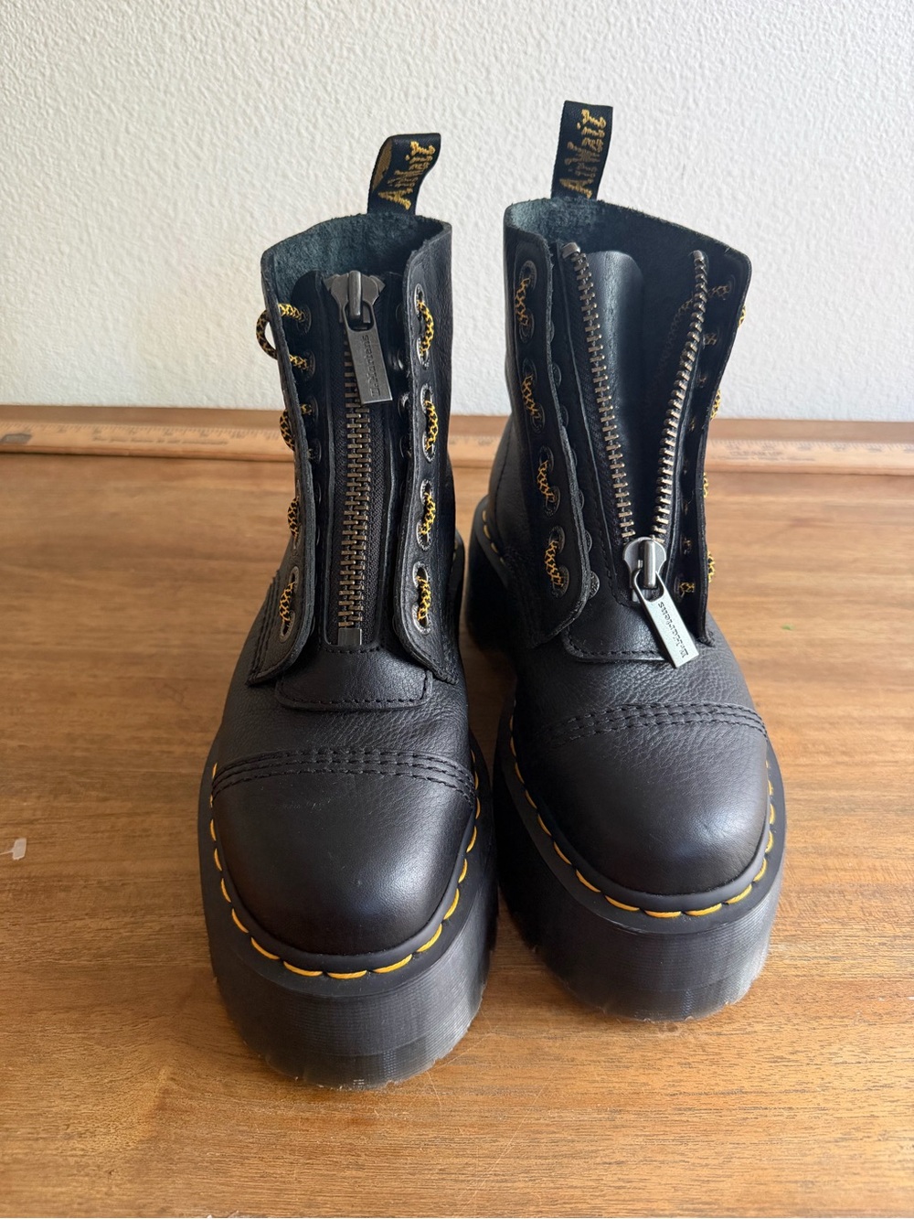Dr. Martens Black Platform Zip Combat Boots with Yellow Stitching